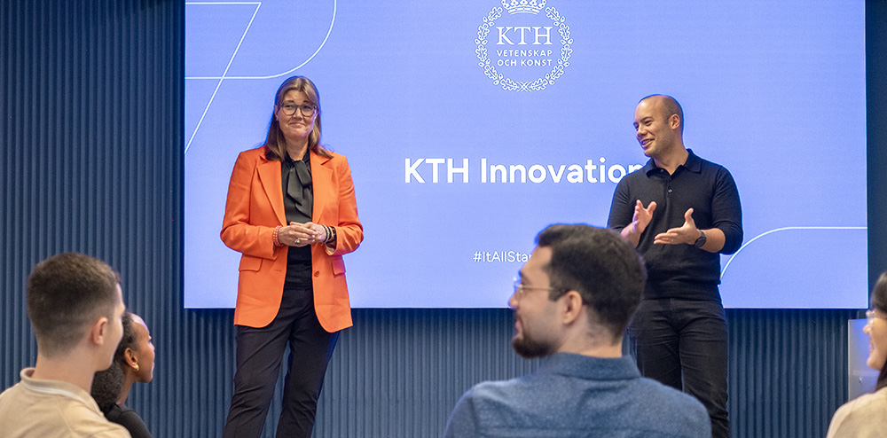 A man and a woman holding a presentation