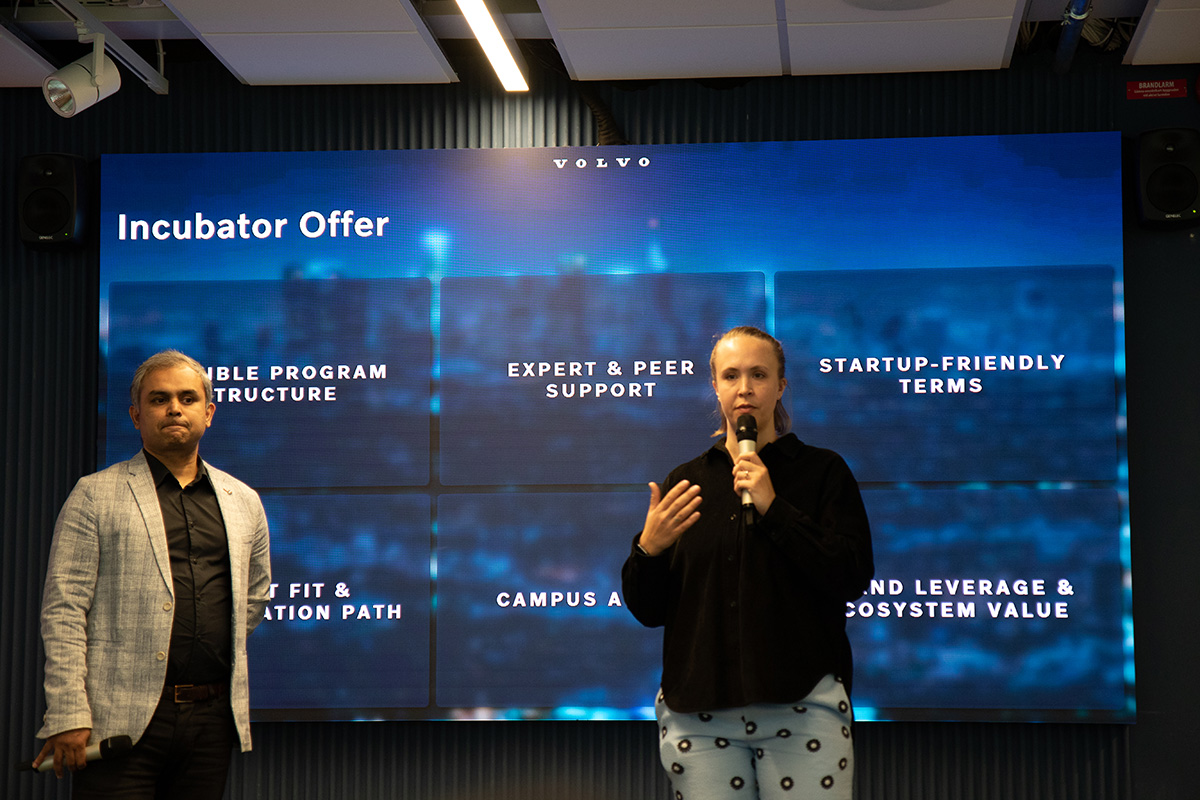 A man and a woman holding a presentation